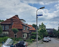 003 - Motor geparkeerd bij entree Bankastraat - Amersfoort Parkeerplaats van de motor op het kleine pleintje bij Tante Door (Bankastraat) in Amersfoort